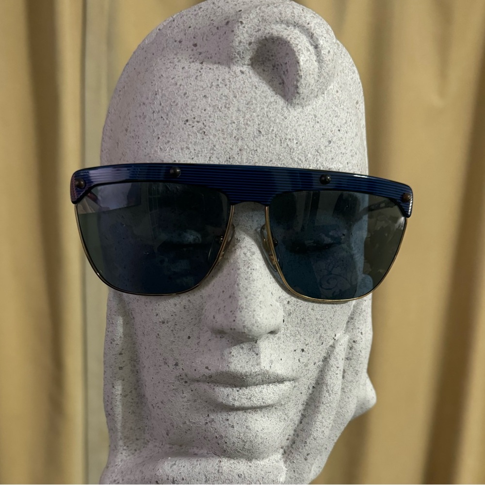 Vintage 80’s Playboy sunglasses. Blue and gold metal frame. Case not included.